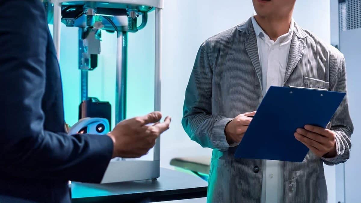 Qualified personnel carrying out a laser safety assessment on-site.