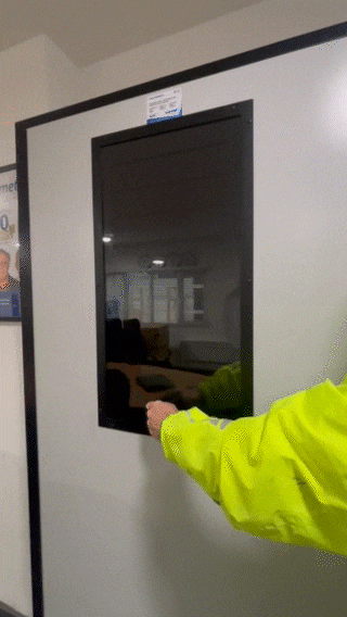 Caiman Laser Safety Blinds showing manual lever operation